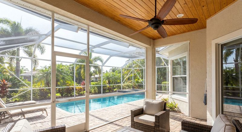 Screened lanai enclosure attached to a Florida home