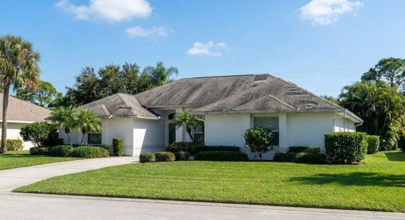 The same Gainesville roof before the Trini Homes replacement